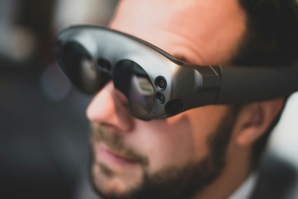 A man using simplified glass which enhances the spatial computing experience