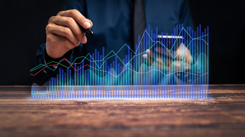 A person pointing a stylus at a glowing digital dashboard with bar graphs and line charts, representing rapid business growth outpacing internal systems.