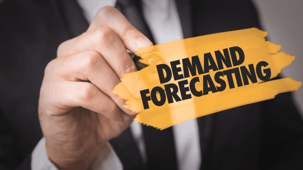 Businessperson in a suit writing “Demand Forecasting” on a glass screen inside an orange brushstroke